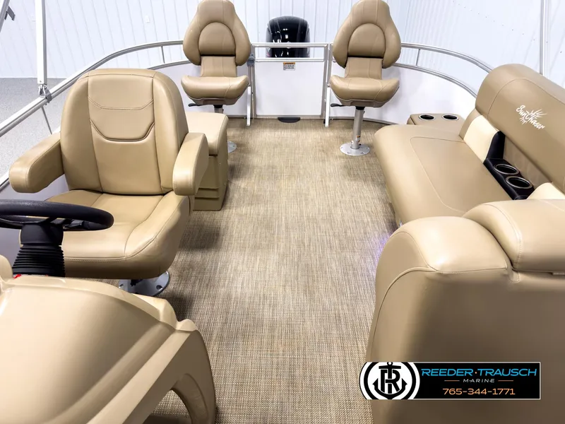 Slide: The Image of 2023 SunChaser 20 Vista Fish boat interior with beige seating and carpet flooring. - 14