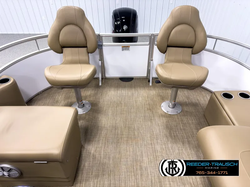Slide: The Image of 2023 SunChaser 20 Vista Fish boat interior with tan seating and carpet flooring. - 15