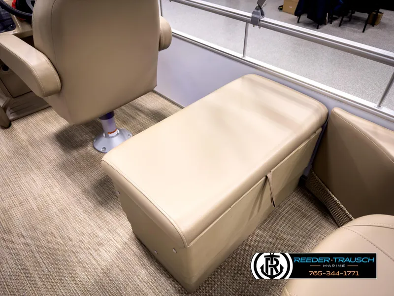 Slide: The Image of 2023 SunChaser 20 Vista Fish boat interior with beige seating and carpet flooring. - 22