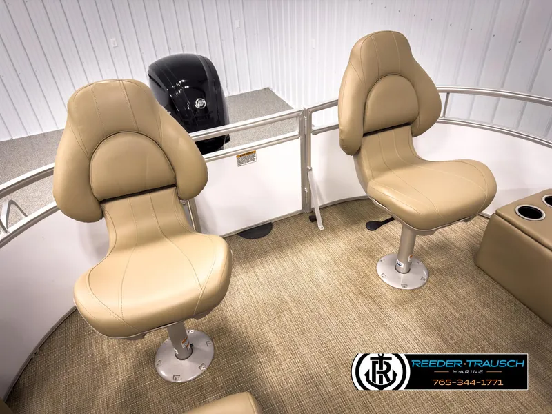 Slide: The Image of 2023 SunChaser 20 Vista Fish boat interior with beige seats and carpeted flooring. - 24
