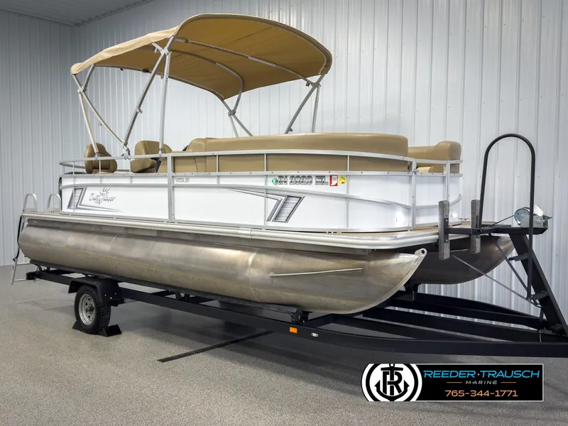 Slide: The Image of 2023 SunChaser 20 Vista Fish pontoon boat on trailer in showroom. - 3