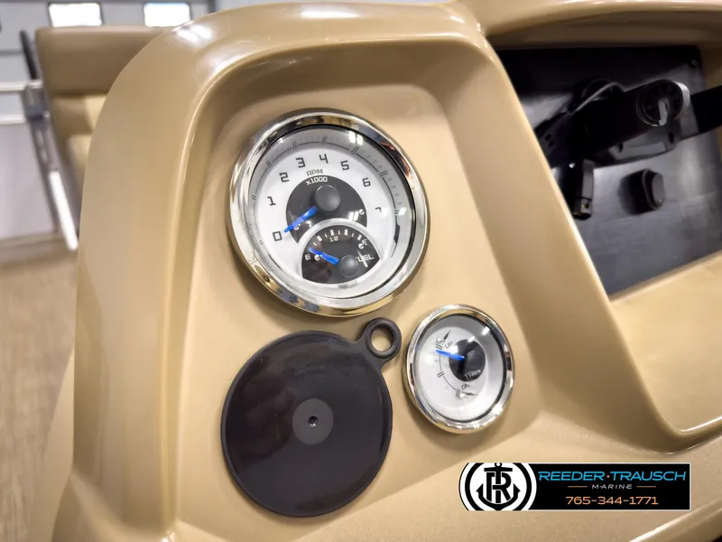 Slide: The Image of Dashboard of 2023 SunChaser 20 Vista Fish boat with gauges and controls. - 30