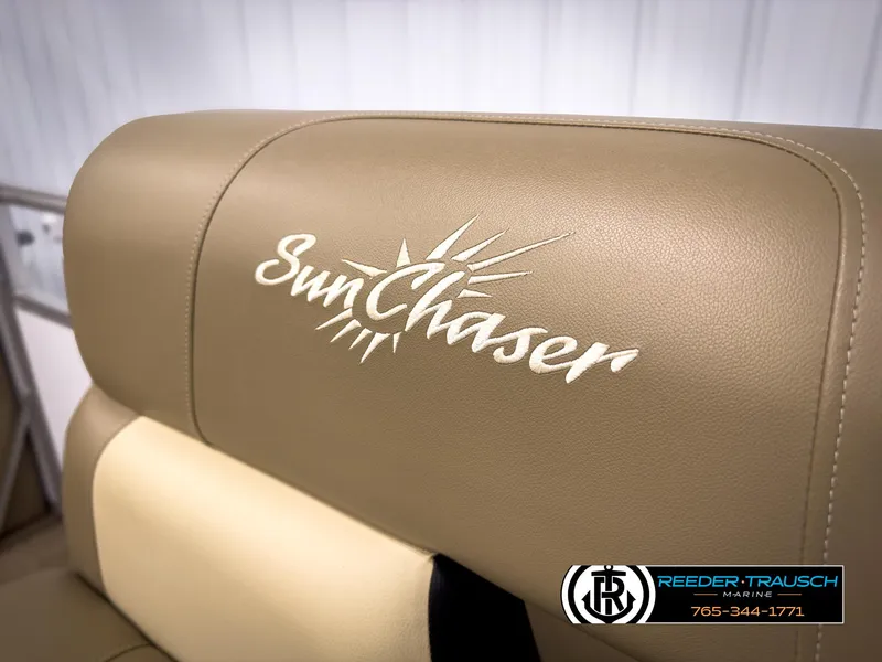 Slide: The Image of SunChaser 20 Vista Fish 2023 boat seat with logo, beige upholstery. - 35