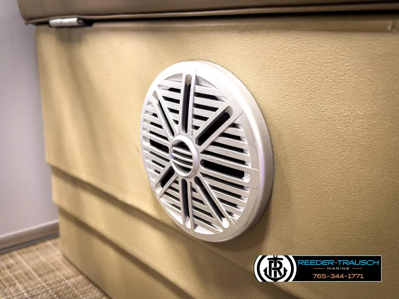 Slide: The Image of Speaker on 2023 SunChaser 20 Vista Fish boat interior, beige upholstery. - 37