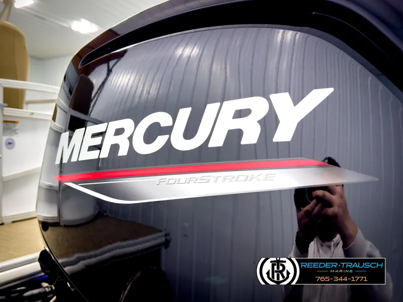 Slide: The Image of Mercury FourStroke engine on 2023 SunChaser 20 Vista Fish boat, Reeder-Trausch Marine branding. - 39