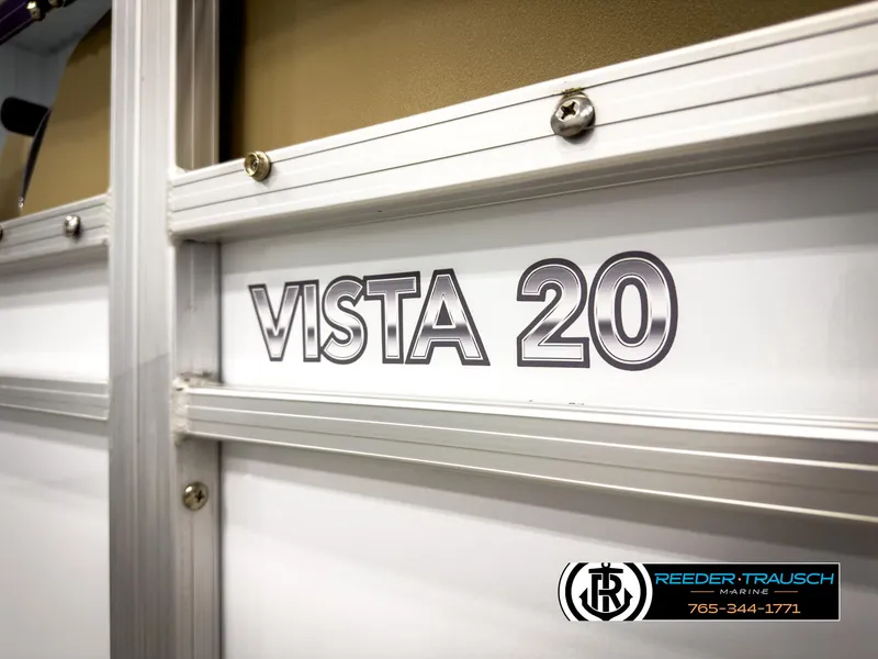Slide: The Image of 2023 SunChaser 20 Vista Fish boat detail with logo and dealership information. - 42