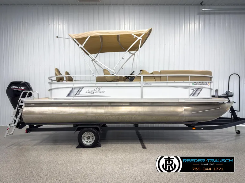 Slide: The Image of 2023 SunChaser 20 Vista Fish pontoon boat with canopy on trailer. - 5