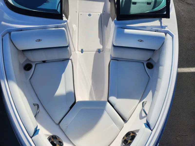 Slide: The Image of 2016 Regal 2000 ESX Bowrider interior with white seating and open bow layout. - 17