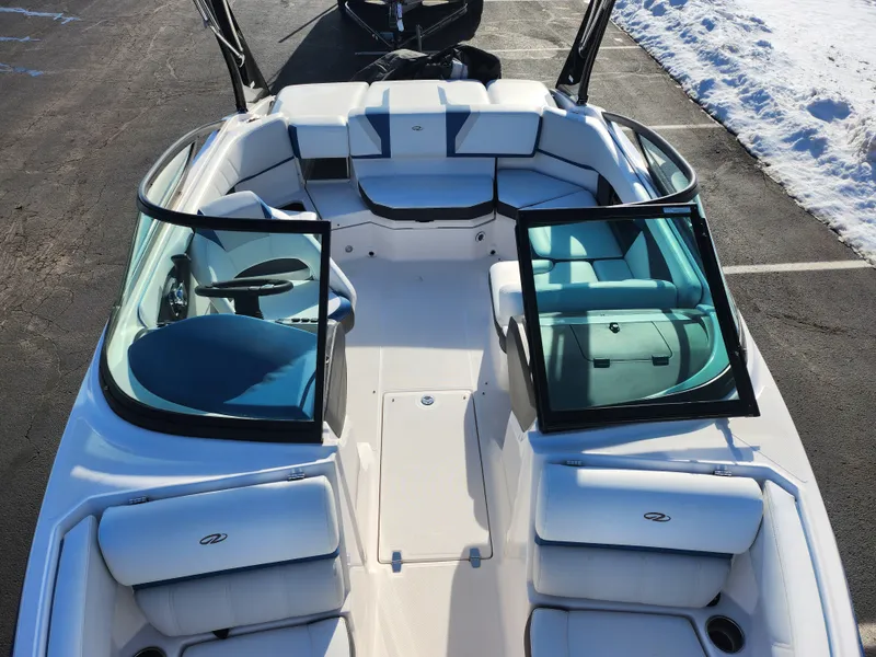 Slide: The Image of 2016 Regal 2000 ESX Bowrider boat with white seating and open windshield. - 18