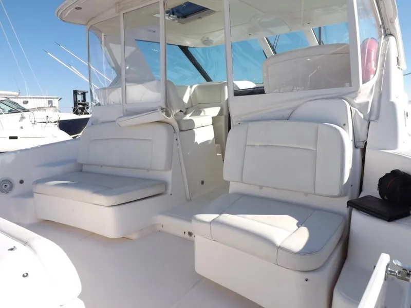 Slide: The Image of 2007 Tiara Yachts 3600 Sovran interior with white seating and clear windows. - 16