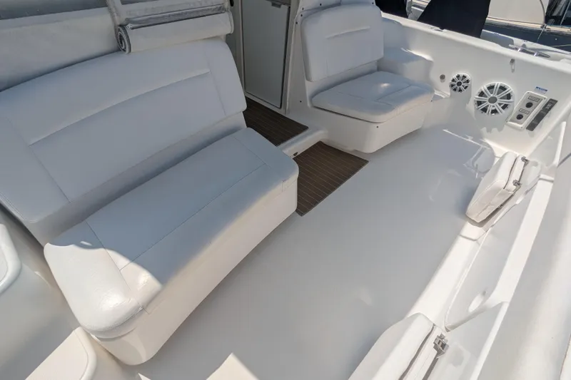 Slide: The Image of 2007 Tiara Yachts 3600 Sovran interior with white seating and modern amenities. - 17