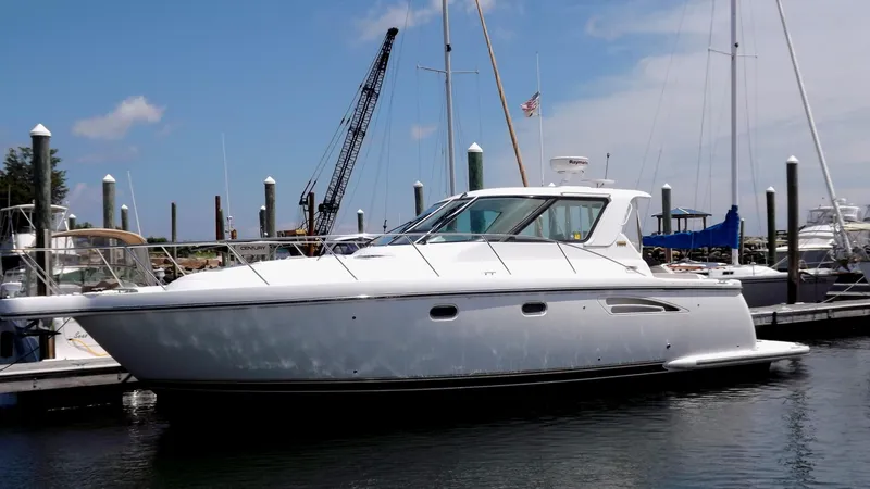 Slide: The Image of 2007 Tiara Yachts 3600 Sovran docked at marina, side view. - 3