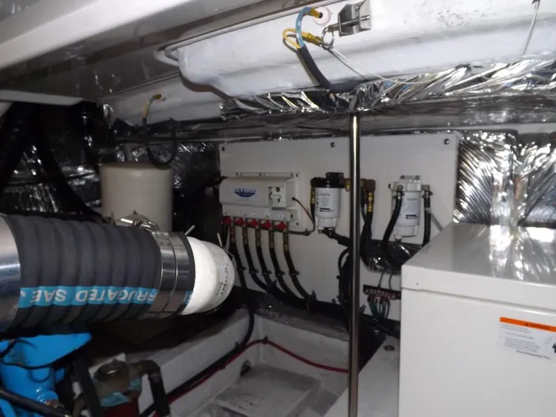 Slide: The Image of Engine room of 2007 Tiara Yachts 3600 Sovran with mechanical components and wiring. - 39