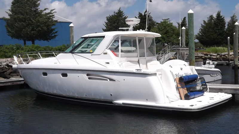 Slide: The Image of 2007 Tiara Yachts 3600 Sovran docked, showcasing sleek design and luxury features. - 4