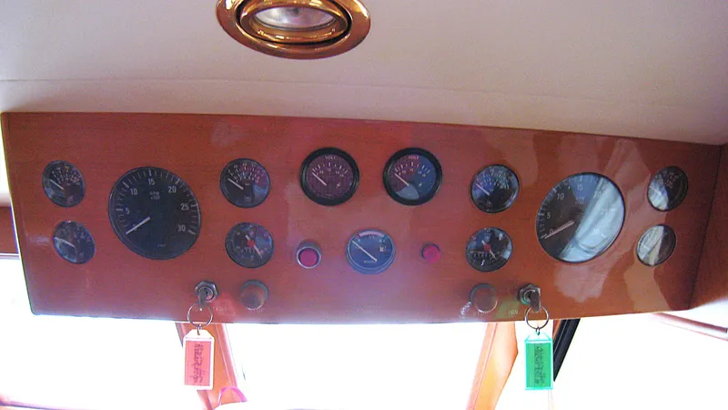 Slide: The Image of Dashboard of 2003 Ocean Alexander 423 Classicco with gauges and controls. - 16