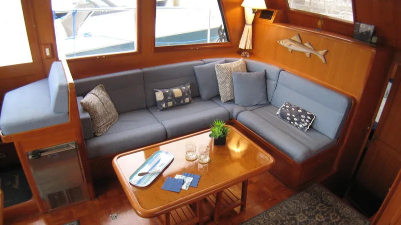 Slide: The Image of Luxurious 2003 Ocean Alexander 423 Classicco yacht interior with cozy seating and elegant decor. - 21