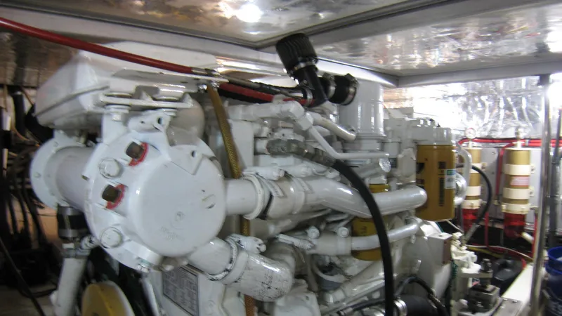 Slide: The Image of Engine room of 2003 Ocean Alexander 423 Classicco yacht, showcasing mechanical components. - 38