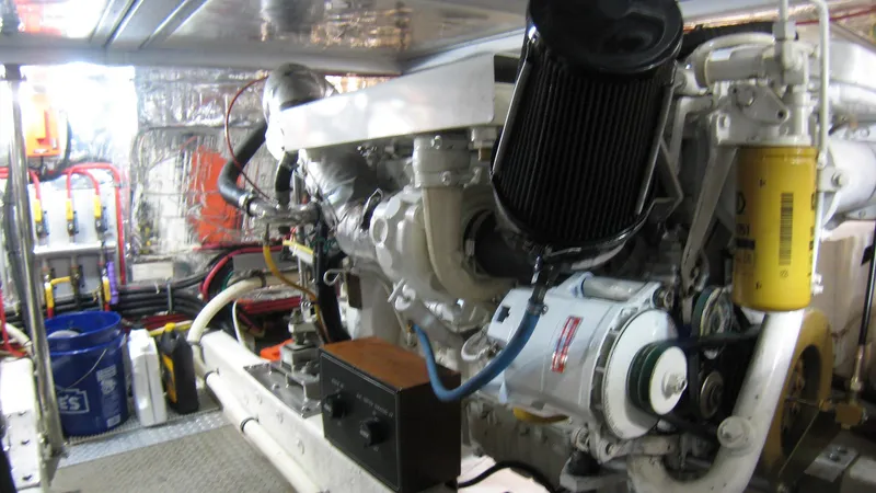 Slide: The Image of Engine room of 2003 Ocean Alexander 423 Classicco yacht, showcasing mechanical components. - 39