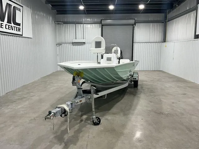 Slide: The Image of 2025 G3 Bay 20 boat in a showroom, front view on a trailer. - 2