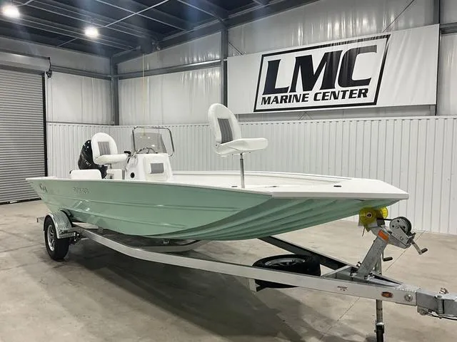 Slide: The Image of 2025 G3 Bay 20 boat on trailer at LMC Marine Center showroom. - 5