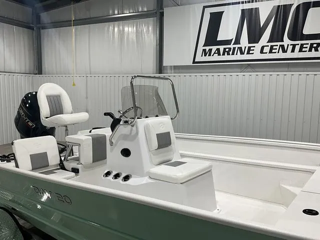 Slide: The Image of 2025 G3 Bay 20 boat at LMC Marine Center, featuring sleek white design and modern seating. - 7