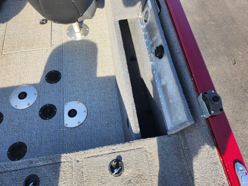 Slide: The Image of 2022 Tracker Pro Guide V-175 WT boat interior with seating and storage compartments. - 12