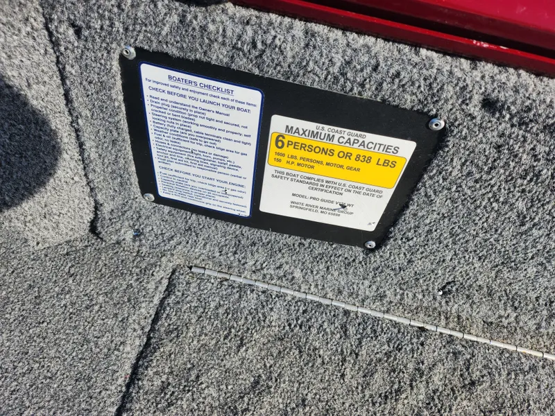 Slide: The Image of 2022 Tracker Pro Guide V-175 WT capacity label, maximum 6 persons or 838 lbs. - 13