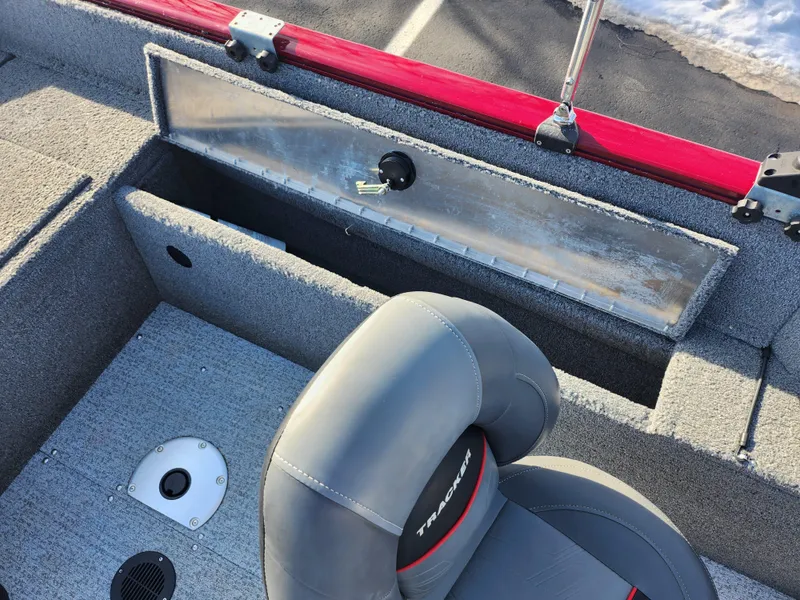 Slide: The Image of 2022 Tracker Pro Guide V-175 WT boat interior with storage compartment and seating. - 21
