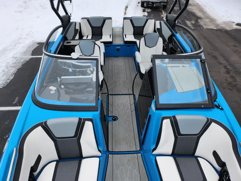Slide: The Image of 2022 Yamaha Boats 255XD interior, featuring sleek seating and modern design. - 18