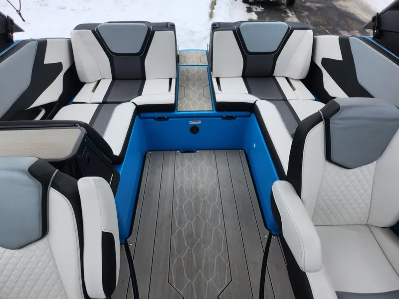 Slide: The Image of 2022 Yamaha Boats 255XD interior with modern seating and sleek design. - 19