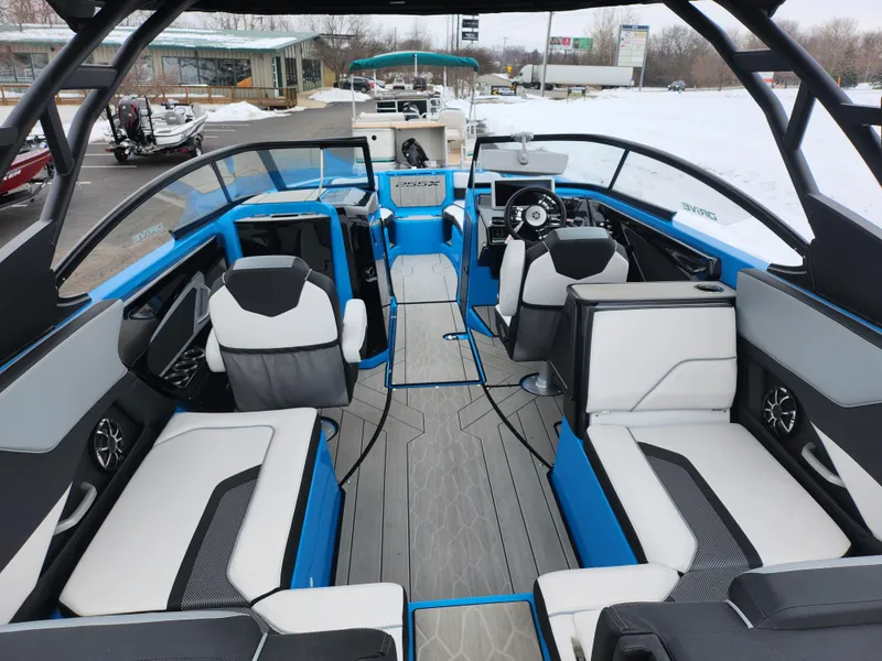 Slide: The Image of 2022 Yamaha Boats 255XD interior with modern seating and sleek design. - 9