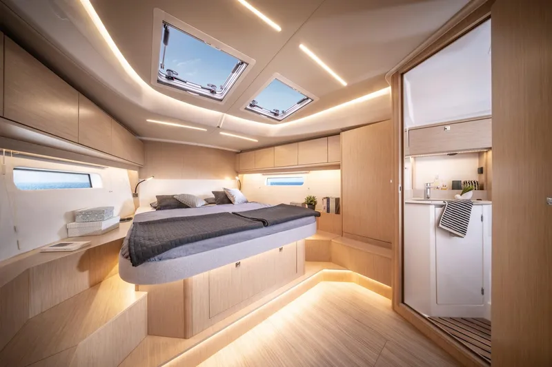 Slide: The Image of Luxurious interior of 2025 Bavaria C46 yacht with modern design and ambient lighting. - 14