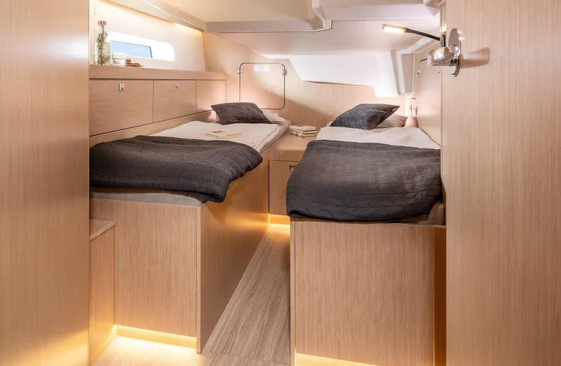 Slide: The Image of Luxurious cabin interior of 2025 Bavaria C46 yacht with twin beds and modern lighting. - 17