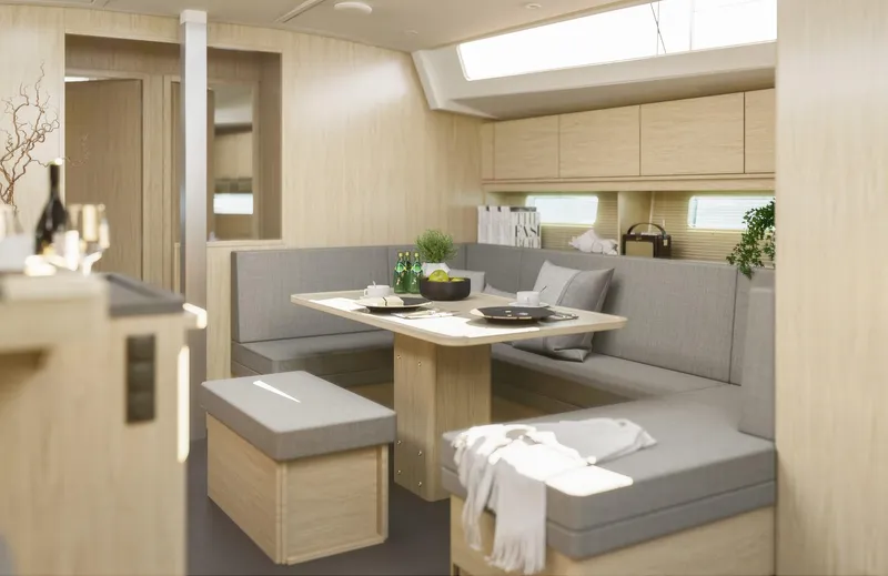 Slide: The Image of Modern interior of 2025 Bavaria C46 yacht with cozy seating and dining area. - 9