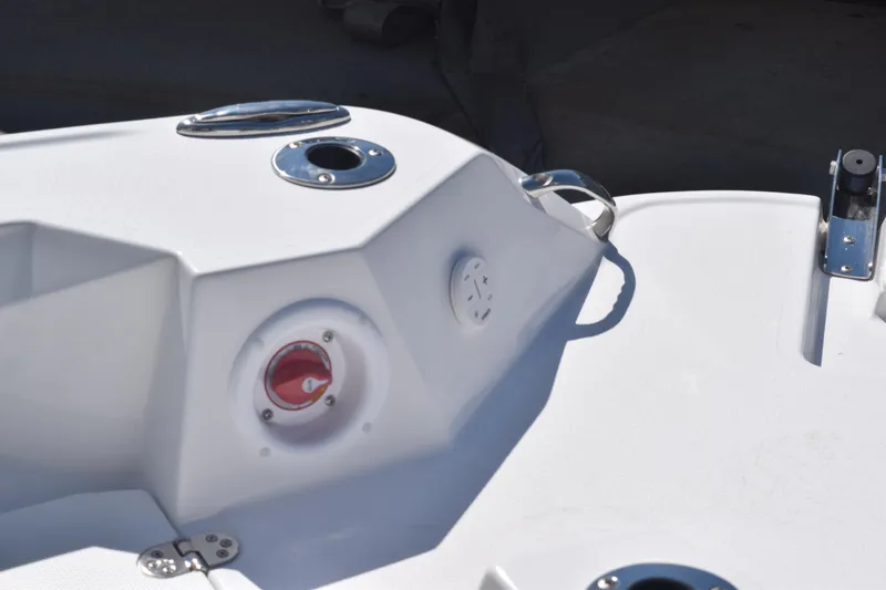 Slide: The Image of 2025 Stingray 216CC boat detail with sleek white finish and chrome accents. - 19