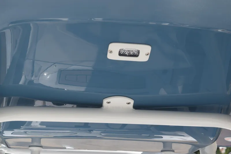 Slide: The Image of 2025 Stingray 216CC boat interior detail with blue finish and mounted light. - 31
