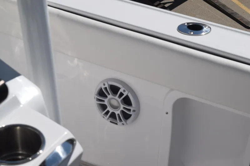Slide: The Image of 2025 Stingray 216CC boat interior with speaker and cup holder. - 40