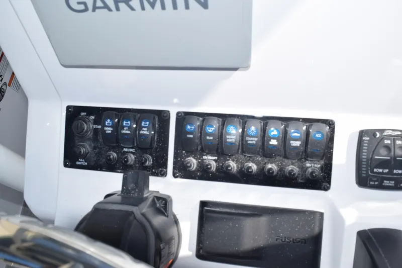 Slide: The Image of Control panel of 2025 Stingray 216CC boat with Garmin electronics. - 9