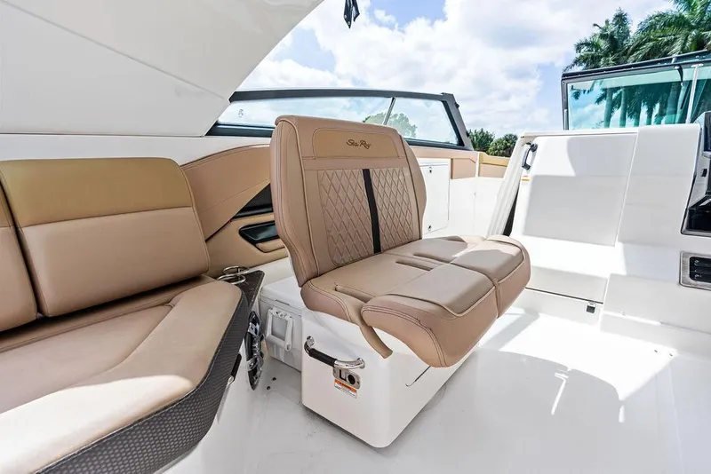 Slide: The Image of 2019 Sea Ray SLX 400 OB interior with tan leather seating and modern design. - 30