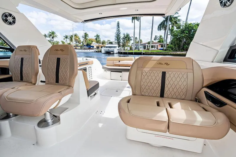 Slide: The Image of Luxurious interior of 2019 Sea Ray SLX 400 OB boat with plush seating. - 31