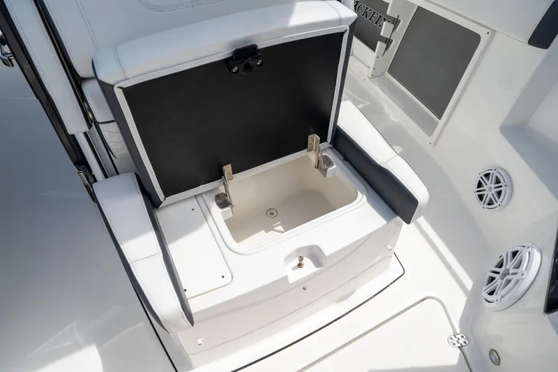 Slide: The Image of 2023 Blackfin 302CC boat interior with open storage compartment. - 49