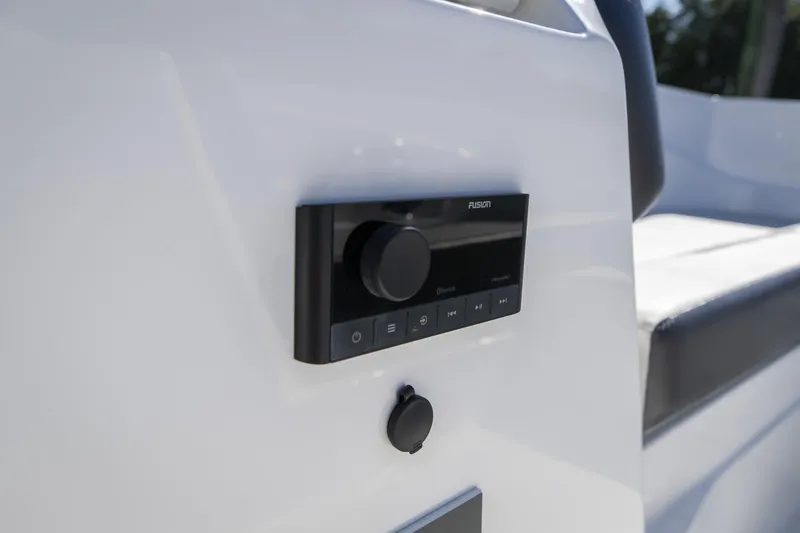 Slide: The Image of 2023 Hurricane SunDeck Sport OB SS 205 OB boat audio control panel. - 16