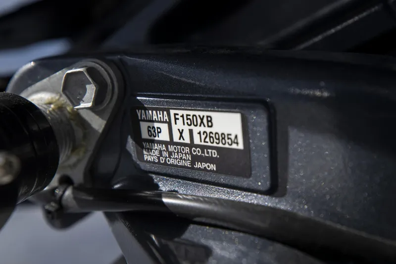 Slide: The Image of Close-up of Yamaha F150XB engine label on 2023 Hurricane SunDeck Sport OB SS 205 OB. - 19