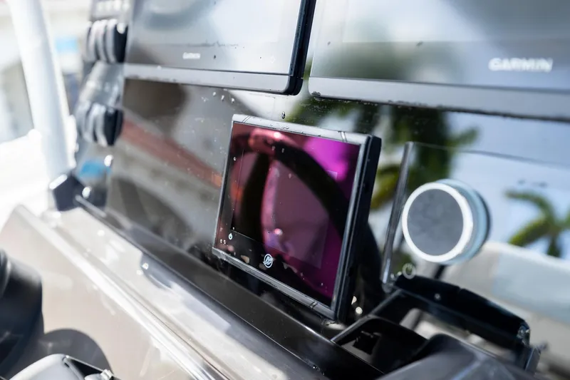 Slide: The Image of Dashboard of 2023 Blackfin 302CC boat with modern navigation equipment. - 32