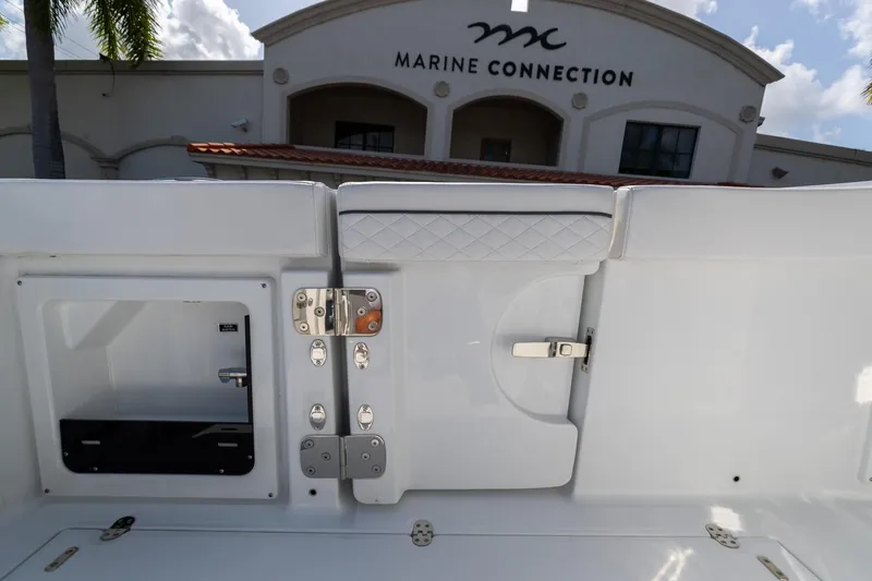 Slide: The Image of 2023 Blackfin 302CC boat interior at Marine Connection dealership. - 25