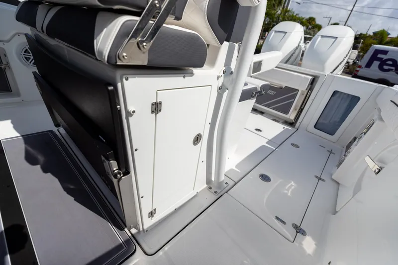 Slide: The Image of 2023 Blackfin 302CC boat interior with seating and storage compartments. - 40