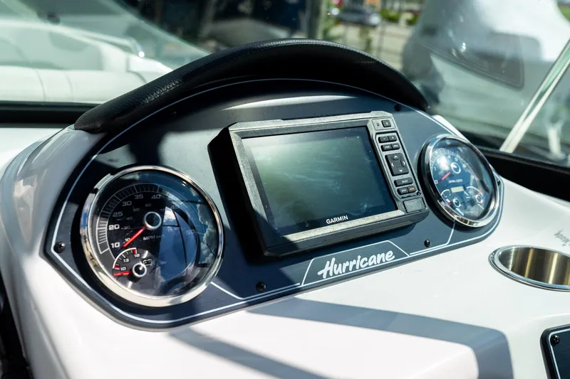 Slide: The Image of Dashboard of 2023 Hurricane SunDeck 2200 OB boat with Garmin display and gauges. - 21