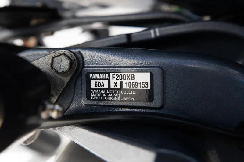 Slide: The Image of Close-up of Yamaha F200XB engine label on 2023 Hurricane SunDeck 2200 OB. - 39