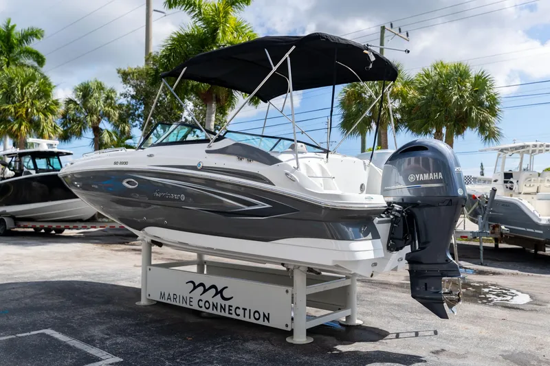 Slide: The Image of 2023 Hurricane SunDeck 2200 OB boat with Yamaha engine on display at Marine Connection. - 6