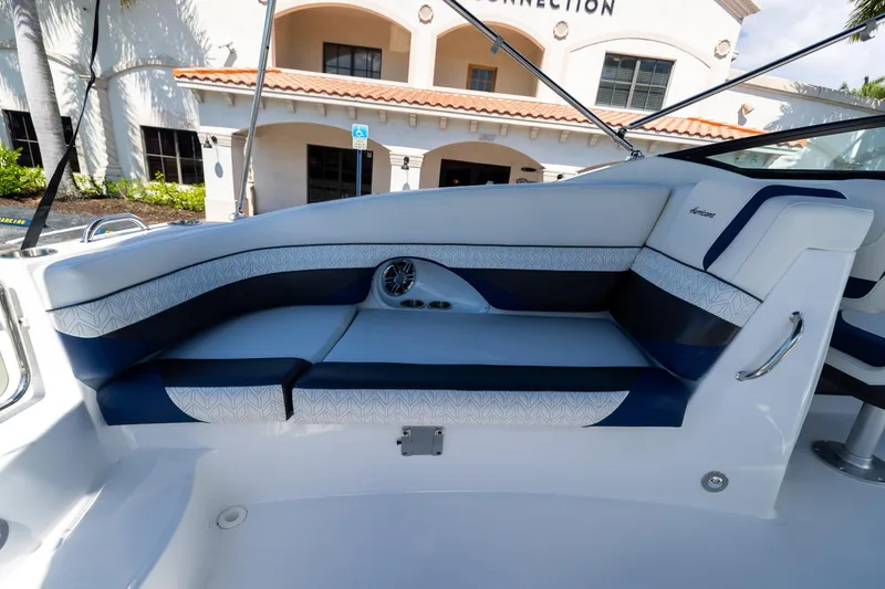 Slide: The Image of 2023 Hurricane SunDeck 2690 OB boat interior with stylish seating and modern design. - 11